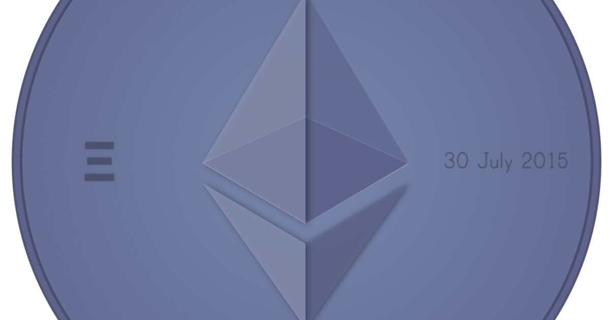 A physical ether coin resting on a dark surface